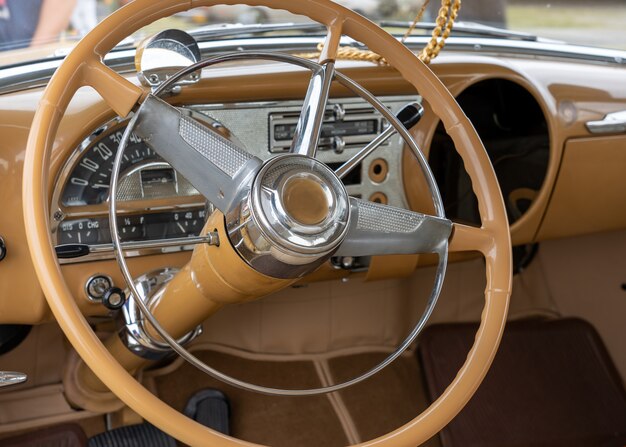 Closeup shot of the interior of a car including the steering wheel