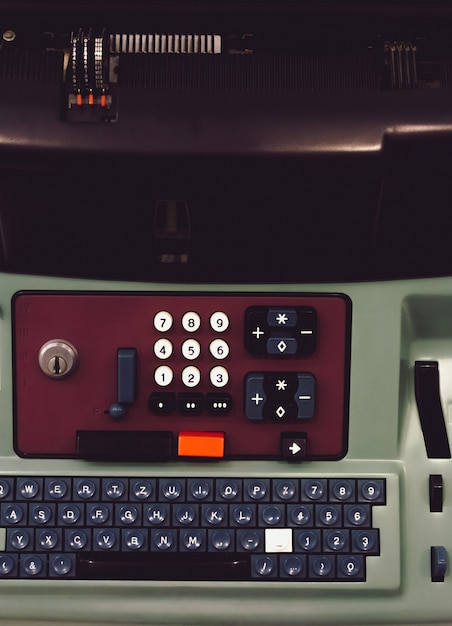 Closeup shot of the keyboard of a machine, including the numbers and letters