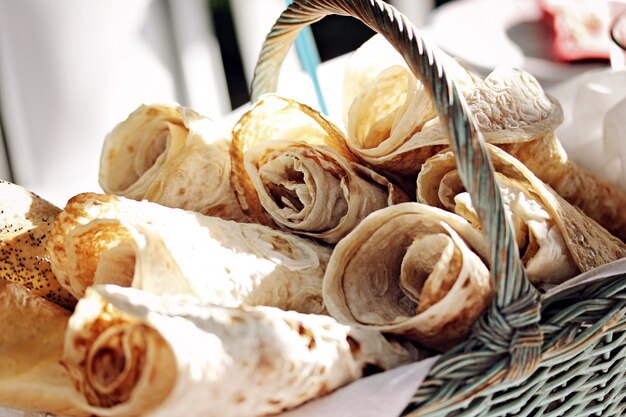 Closeup shot of lavash rolls in a basket
