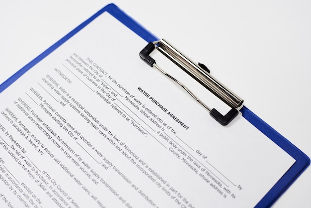 Closeup shot of a legally binding document on a white surface