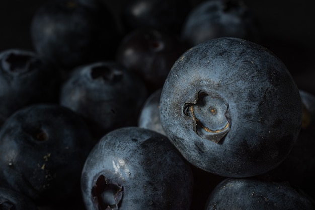 Free photo closeup shot of many blueberries one on another