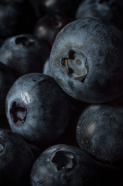 Closeup shot of many blueberries one on another