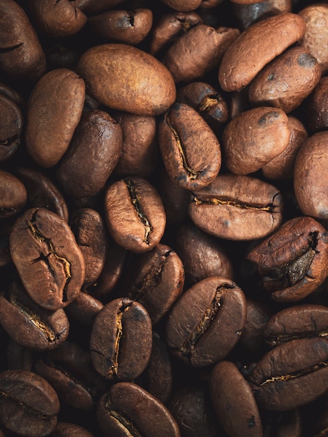 Бесплатное фото Крупным планом выстрел из свежих кофейных зерен кофе текстуры