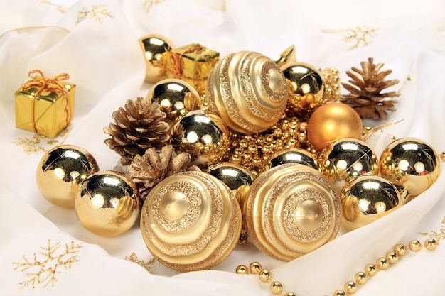 Closeup shot of a pile of golden shiny Christmas decorations