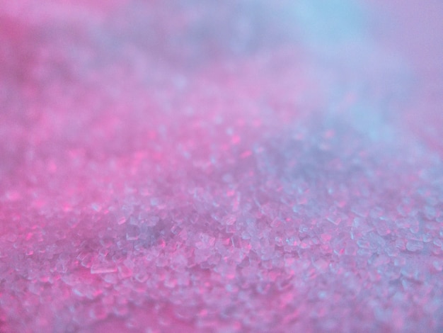 Closeup shot of pink and blue surface with sparkles