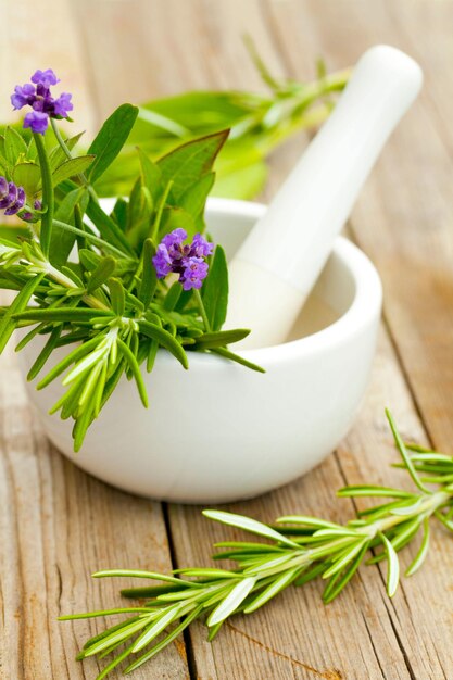 Closeup shot of purple lavender with mortar and pestle - beauty treatment concept