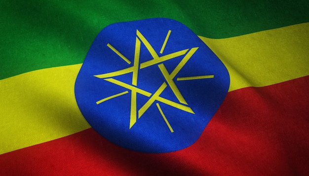 興味深いテクスチャとエチオピアの現実的な手を振る旗のクローズアップショット