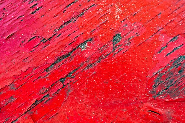 Closeup shot of a red weathered wooden background