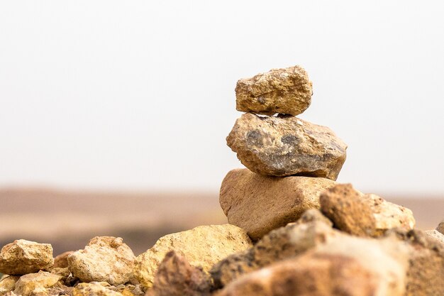 Closeup shot of several rocks balanced on top of each other