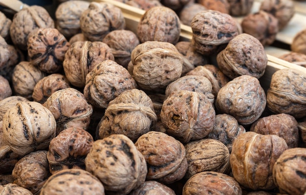 Free photo closeup shot of several walnuts put on top of each other