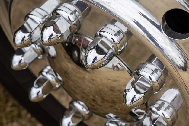 Closeup shot of a shiny metal hub of a car