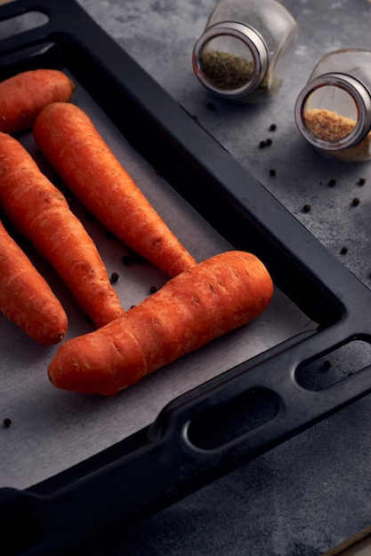 closeup-shot-some-carrots-baking-tray_181624-49976.jpg