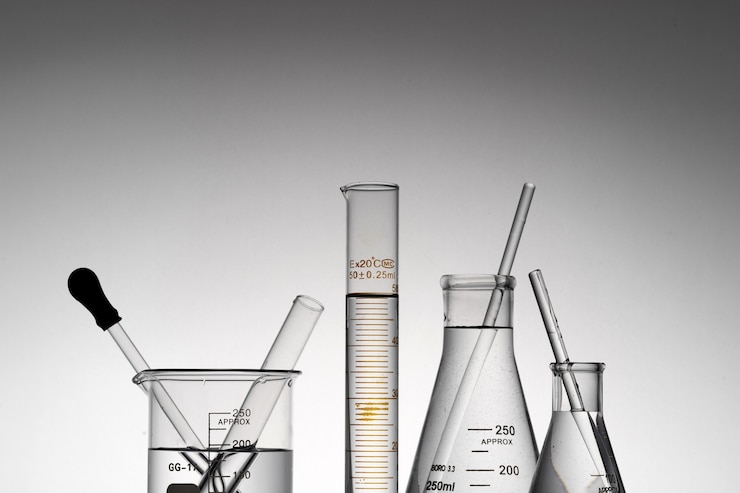 Free Photo closeup shot of transparent laboratory flasks, beakers, and tubes