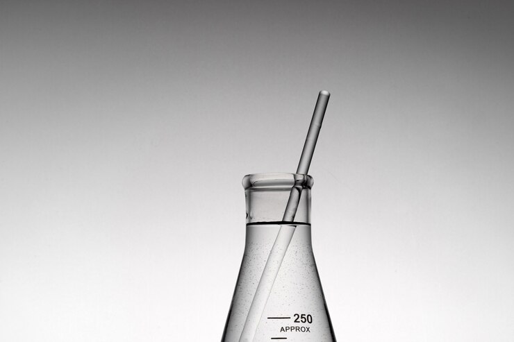 Free Photo closeup shot of a tube inside an erlenmeyer beaker