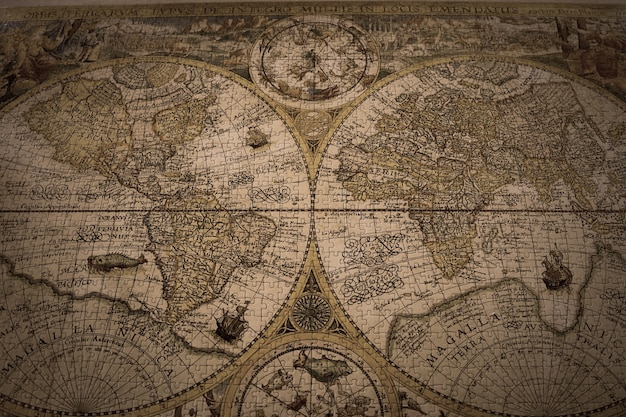 Closeup shot of a vintage world map made with puzzles