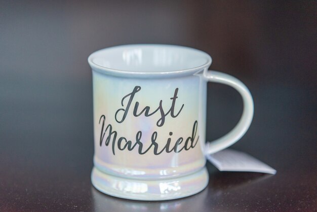 Closeup shot of a white just married mug