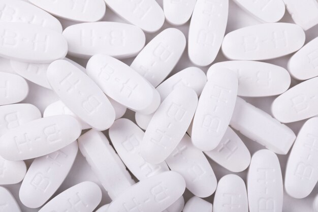 Closeup shot of white pharmaceuticals on a white background