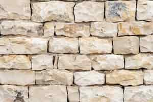 Free photo closeup shot of a white stone wall- a good background