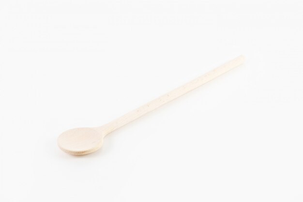 Closeup shot of a wooden spoon isolated