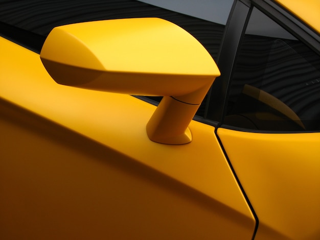 Closeup shot of a yellow sport car