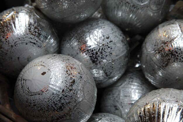 Closeup of the silver baubles of a Christmas tree