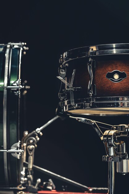 Closeup snare drum on a dark background isolated