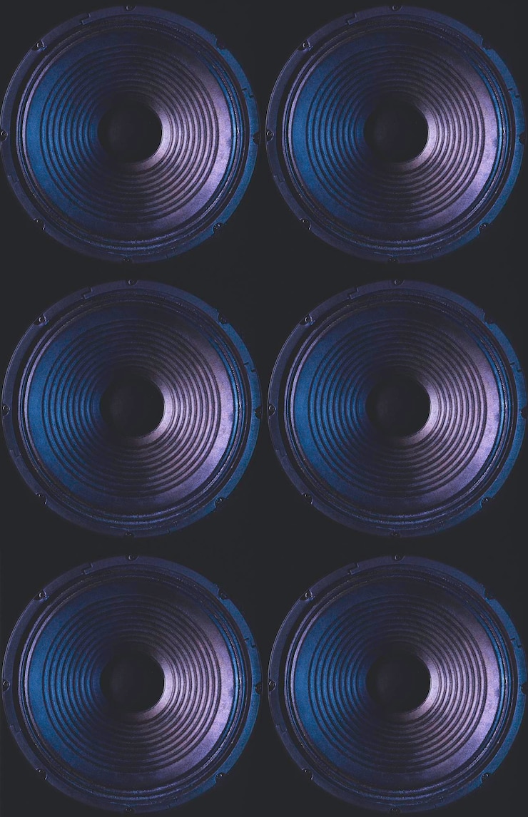 Free Photo closeup of speakers membrane on black background with colored lighting