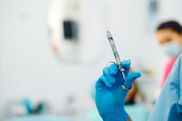 Closeup of syringe with anesthesia, dental clinic