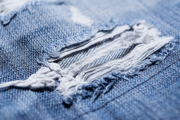 Closeup of a torn part of jeans