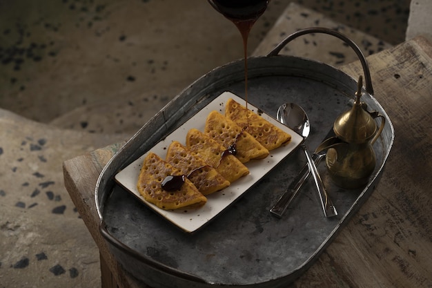 Closeup of traditional emirates dessert on a metallic tray