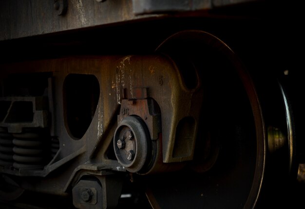 A closeup view of the wheels of a train