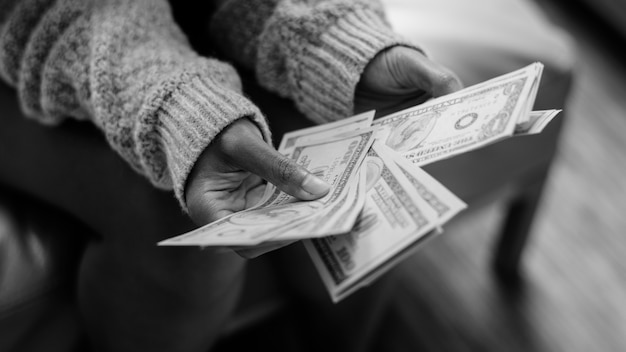 closeup of woman counting money