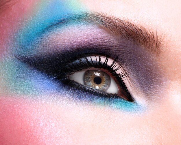 Closeup woman eyes with beautiful  fashion bright blue makeup