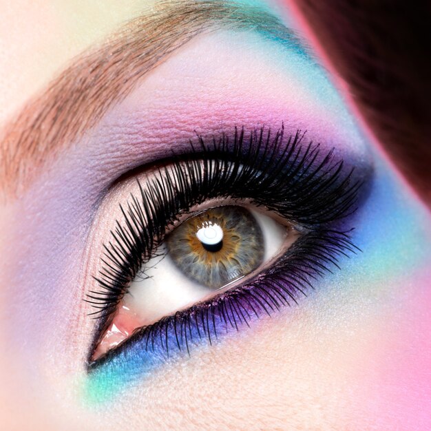 Closeup woman eyes with beautiful  fashion bright blue makeup