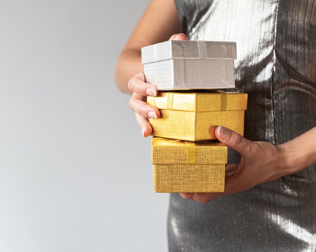 Closeup woman holding black friday gifts