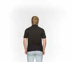 Free photo closeup of young man's body in empty black t-shirt isolated on white space. mock up for disign concept