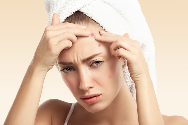 Free photo closeup of young woman with towel on head