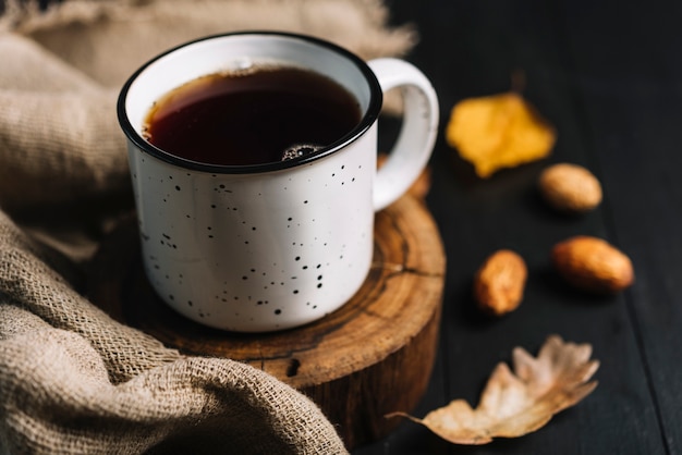 Cloth and drink near leaves and kernels