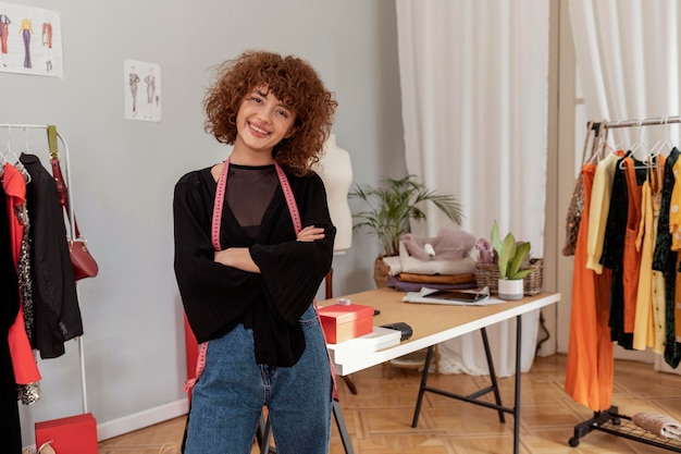 Clothes designer working at store