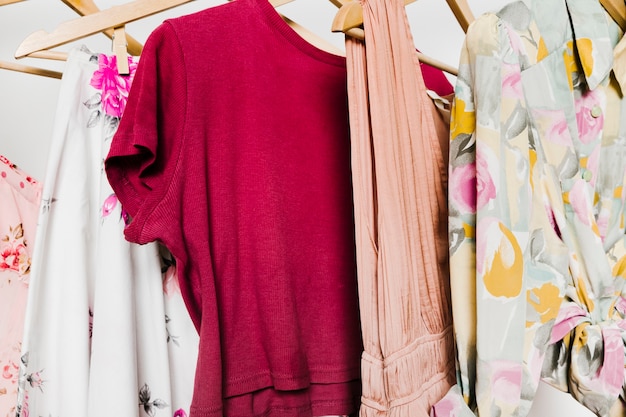 Free photo clothes on hangers close-up