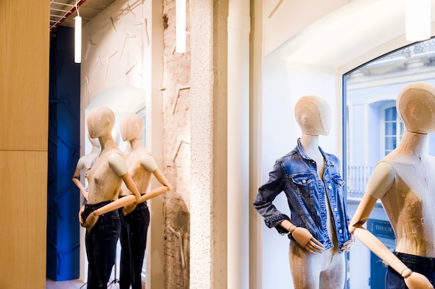 Free photo clothing store with mannequins