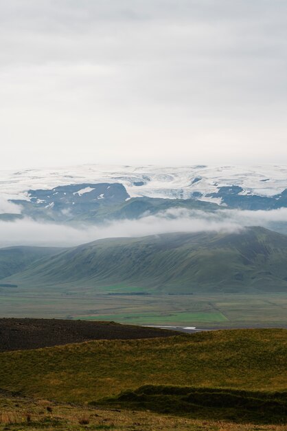 Cloudy nature landscape by lake