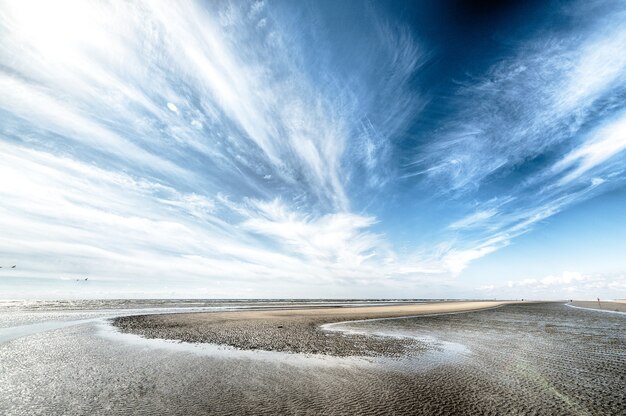 Cloudy sky over dry island