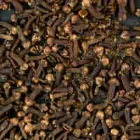 Free photo cloves background top view