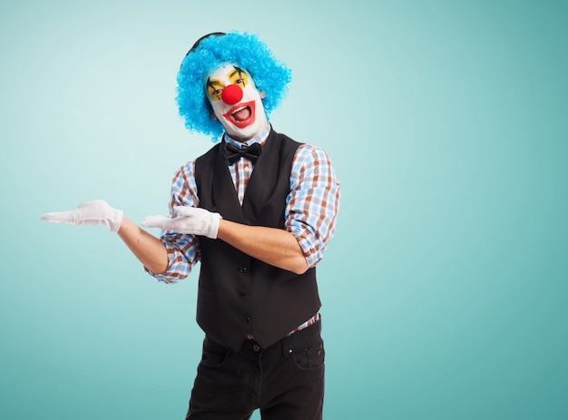 Free photo clown with hands on hips and smiling