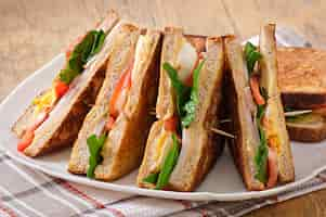 Free photo club sandwich with chicken and ham