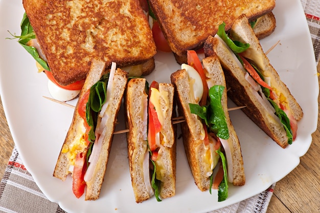 Club sandwich with chicken and ham