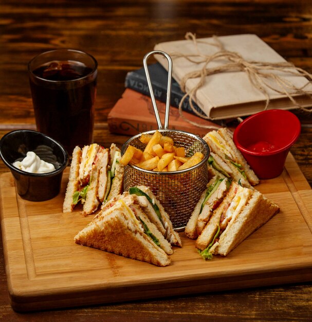 Club sandwich with french fries