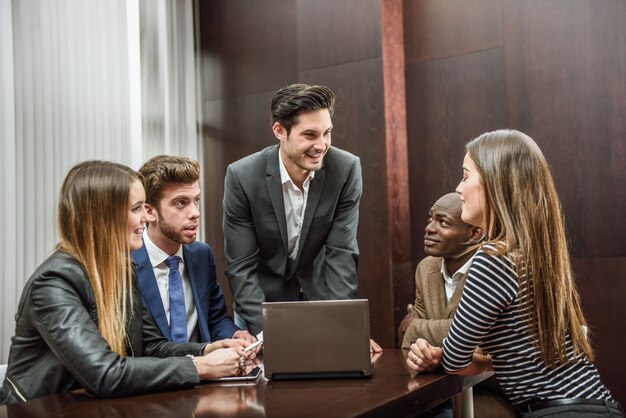 Co-workers talking about the next conference