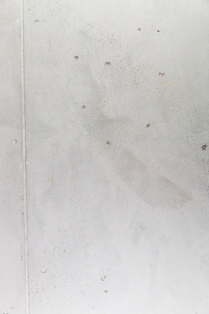 Coarse cement wall surface with holes